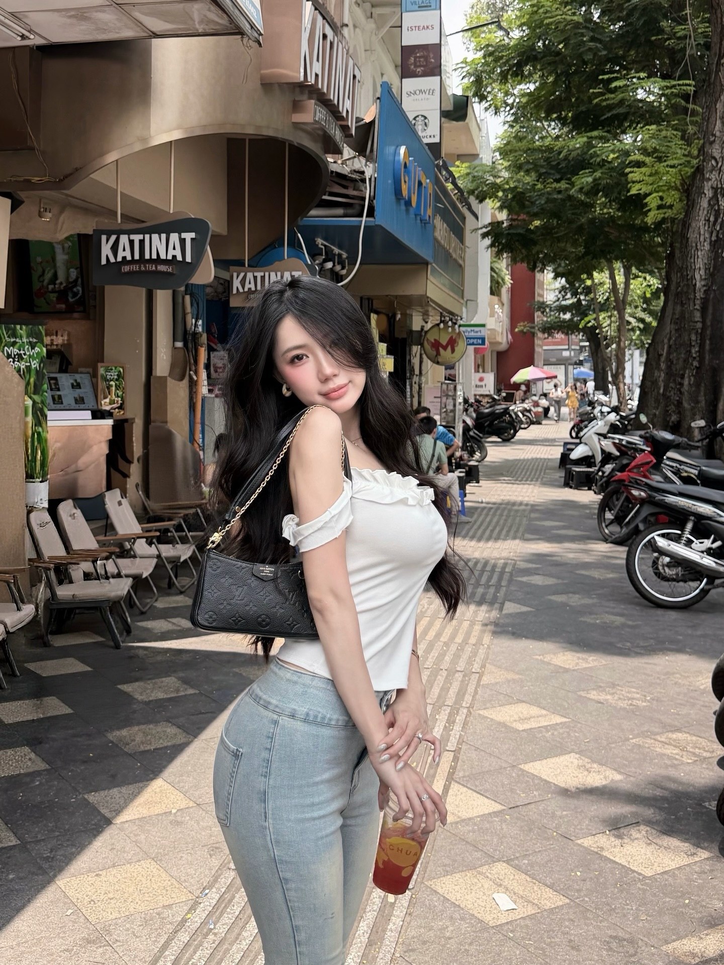 White Ruffle Top & Flared Jeans